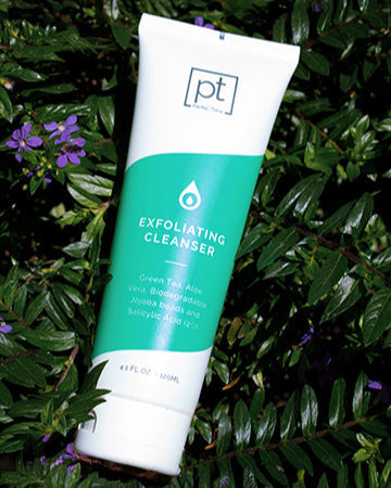 Exfoliating Cleanser in a plant